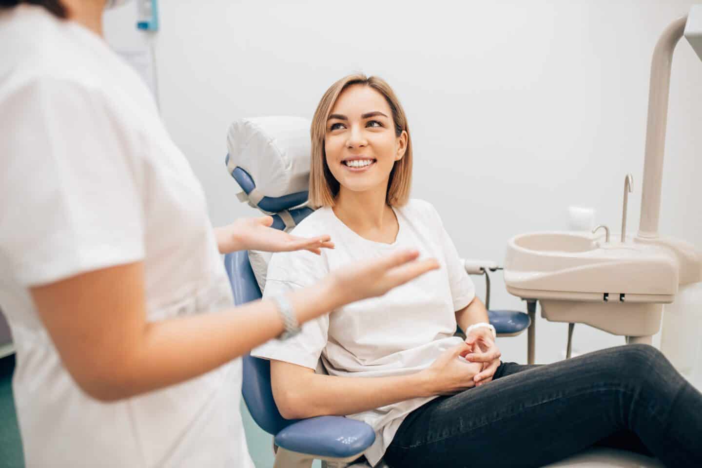 AdobeStock 316558318 scaled - Viera Dental Arts | Dentist in Melbourne FL young beautiful lady with blond short hair sit in dentist office, waiting for a teeth treatment. Medicine, dentist concept